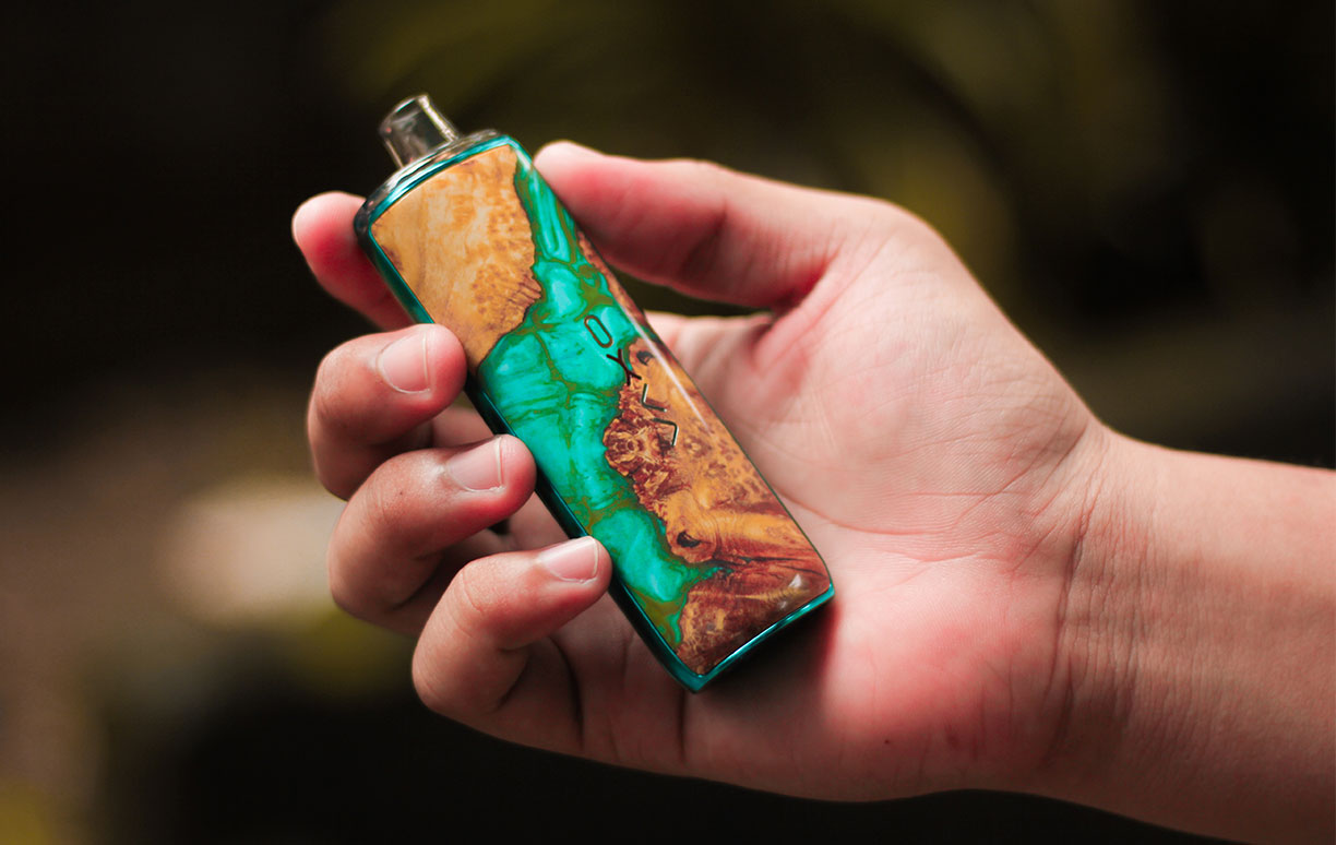 Person Holding a Vape